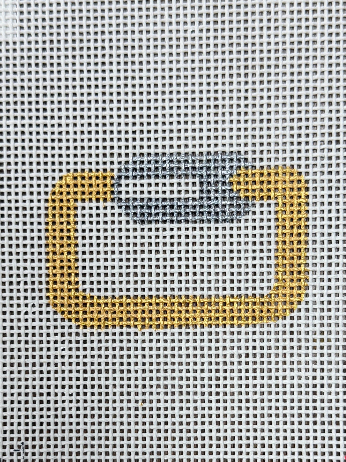 Gold carabineer bag tag